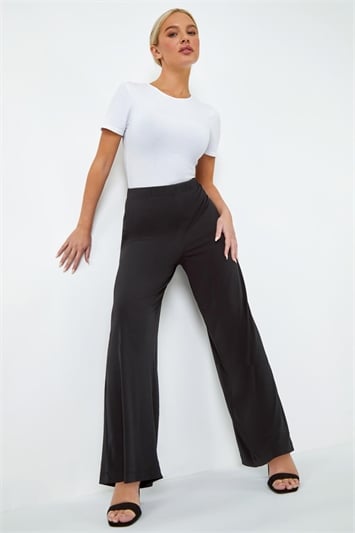 Petite Black Flared Trousers | Petite | PrettyLittleThing